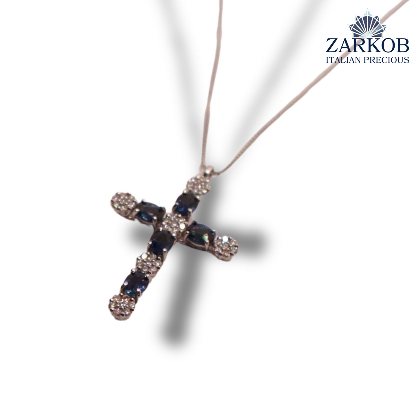 Collana Croce Oro Bianco gr.3,3 e Diamanti Bianchi 0,24 ct e Zaffiri Naturali (0,90)