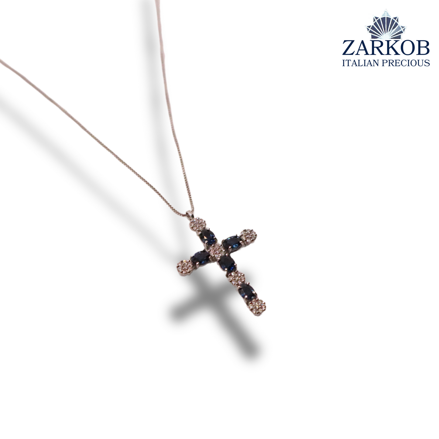 Collana Croce Oro Bianco gr.3,3 e Diamanti Bianchi 0,24 ct e Zaffiri Naturali (0,90)