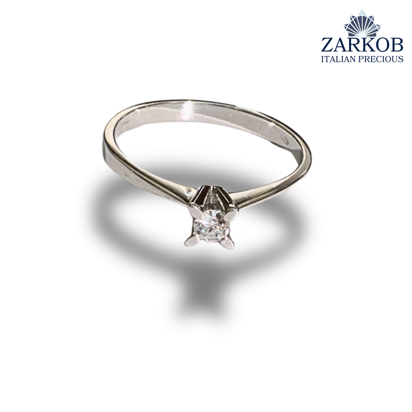 Anello Solitario Lineare a 4 Griffe in Oro Bianco gr. 2,25 e Diamanti Naturali ct. 0,12